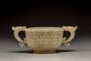 A celadon jade twin-handled cup