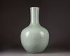 A large Chinese celadon-glazed moulded bottle vase