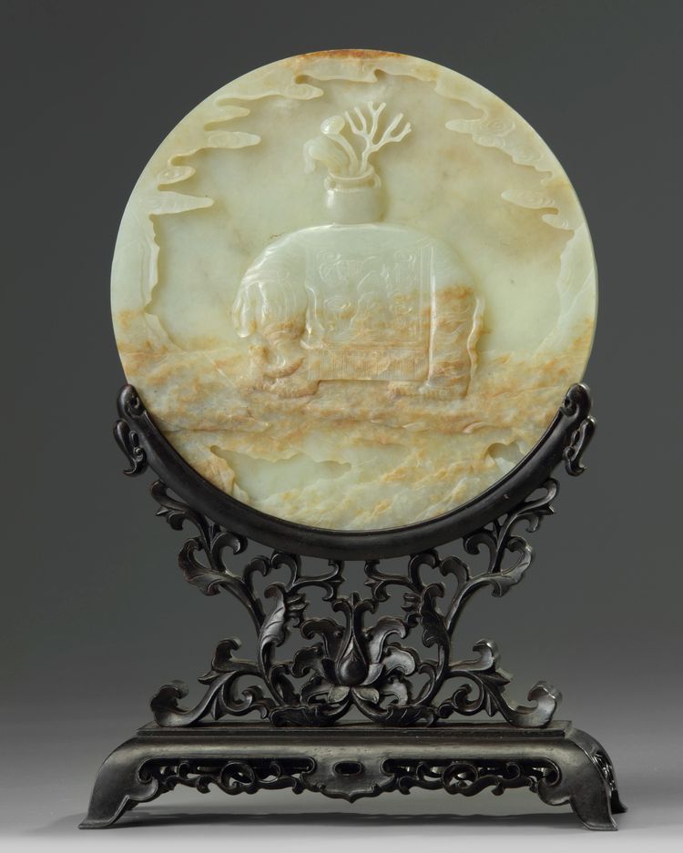 A Chinese celadon jade circular table screen