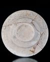 A SLIP-PAINTED POTTERY DISH PERSIA, 10TH CENTURY