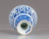 A Chinese blue and white lanca character stem cup