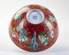 A FINE CORAL-GROUND FAMILLE VERTE 'BOYS' BOWL