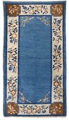 A CHINESE WOOL PEKING RUG, 20TH CENTURY
