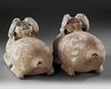 A PAIR OF TERRACOTTA VESSELS IN THE FORM OF A RAM, HAN DYNASTY (206 BC-220 AD)
