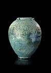 A LARGE UMAYYAD TURQUOISE-GREEN GLAZED JAR, MESOPOTAMIA, 7TH-8TH CENTURY