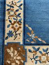 A CHINESE WOOL PEKING RUG, 20TH CENTURY