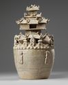 A CHINESE YUE-STYLE CELADON-GLAZED FUNERAL URN, HUNPING 3RD-CENTURY STYLE