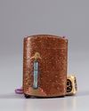 A Japanese Inro with a cubical shaped netsuke