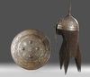 A GOLD-DAMASCENED STEEL HELMET AND SHIELD, QAJAR, PERSIA, EARLY 19TH CENTURY