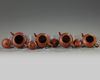 Four small Chinese yixing teapots and covers