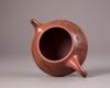 A Chinese yixing tripod teapot and cover