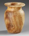 AN EGYPTIAN ALABASTER VASE, 26TH DYNASTY OR LATER