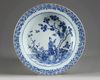A Chinese blue and white 'lady and boy' basin