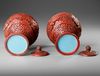 TWO CARVED CINNABAR LACQUER STEM-BOWLS AND COVERS, 19TH-20TH CENTURY