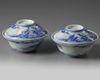 A PAIR OF JAPANESE HIRADO BOWLS AND COVERS, 19TH CENTURY