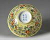 A Chinese yellow-ground famille rose 'gourds' bowl