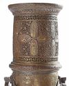 A LARGE ENGRAVED BRASS TORCH STAND, PERSIA, 19TH CENTURY