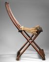 A FINE AND RARE HUANGHUALI FOLDING CHAIR, CHINA 17TH CENTURY