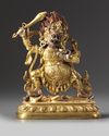 A Sinotibetan gilt bronze figure of mahakala