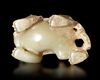 A WHITE JADE CARVING OF PIXIE, CHINA, HAN DYNASTY (206 BC-220 AD)