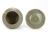 A CHINESE LONGQUAN CELADON ‘HUNDRED RIB’ JAR AND ‘LOTUS’ COVER, MING DYNASTY (1368-1644)