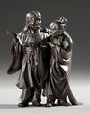 A FINE JAPANESE BRONZE OBJECT 置物 DEPICTING KANZAN 寒山 (HANSHAN) AND JITTOKU 拾得 (SHIDE), MEIJI PERIOD (1868-1912)