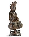 A Chinese gilt-lacquered bronze figure of Avalokitesvara