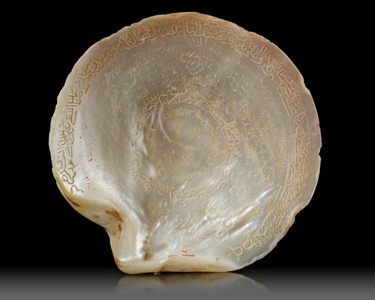 AN INSCRIBED MOTHER-OF PEARL SHELL NACRE, PERSIA OR INDIA, 19TH CENTURY