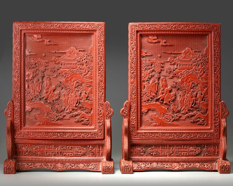 A pair of Chinese cinnabar lacquer 'Luohan' table screens