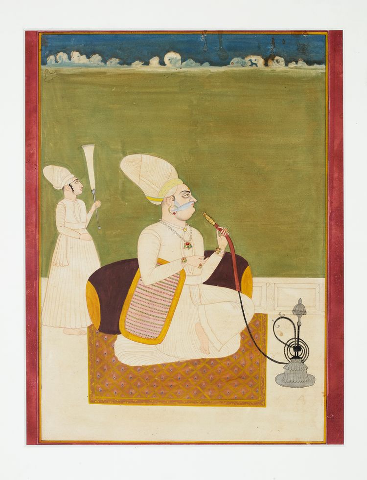 A PRINCE SMOKING A HOOKAH, NORTH INDIA,19TH CENTURY