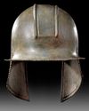A GREEK BRONZE ILLYRIAN HELMET, CIRCA 6TH-5TH CENTURY B.C.
