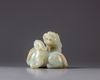 A Chinese celadon jade ‘twin qilin’ carving