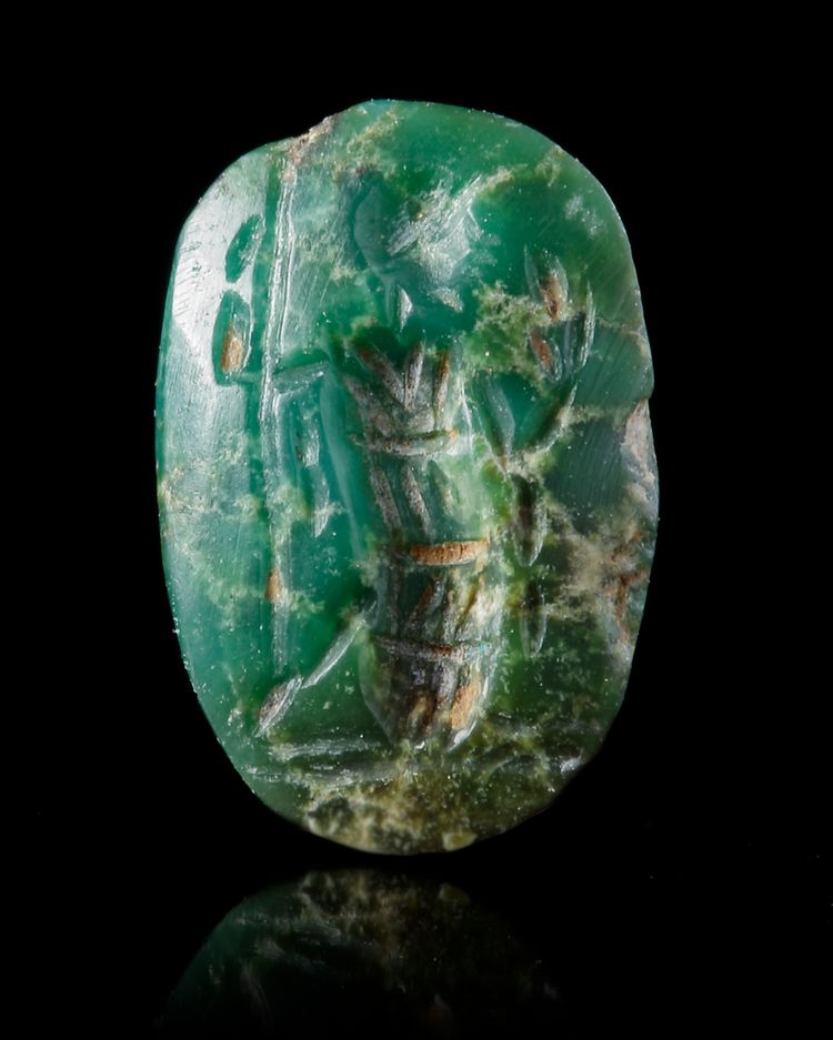 A CHROME BERYL INTAGLIO OF MINERVA STANDING, ROMAN, 1ST-2ND CENTURY AD
