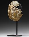 A GRECO-ROMAN GILT BRONZE MASK, CIRCA 1ST CENTURY B.C. / A.D.