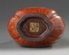 A small Chinese imitation-wood hu vase
