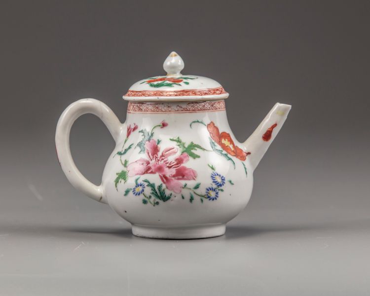 A Chinese famille rose teapot and cover