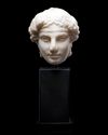 A HEAD OF APOLLO, MARBLE, GREEK, EARLY 4TH CENTURY BC