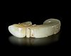 A WHITE JADE DRAGON PENDNT WITH A HUMAN HEAD, CHINA, SHANG DYNASTY