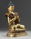 A Tibetan gilt bronze figure of Maitreya