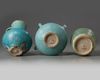Two Islamic turquoise glazed jugs and a bowl