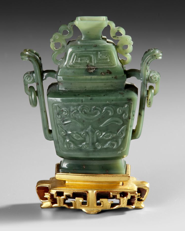 A CHINESE JADE  WITH COVER AND STAND