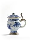 A Chinese blue and white mustard pot with European silver mounts