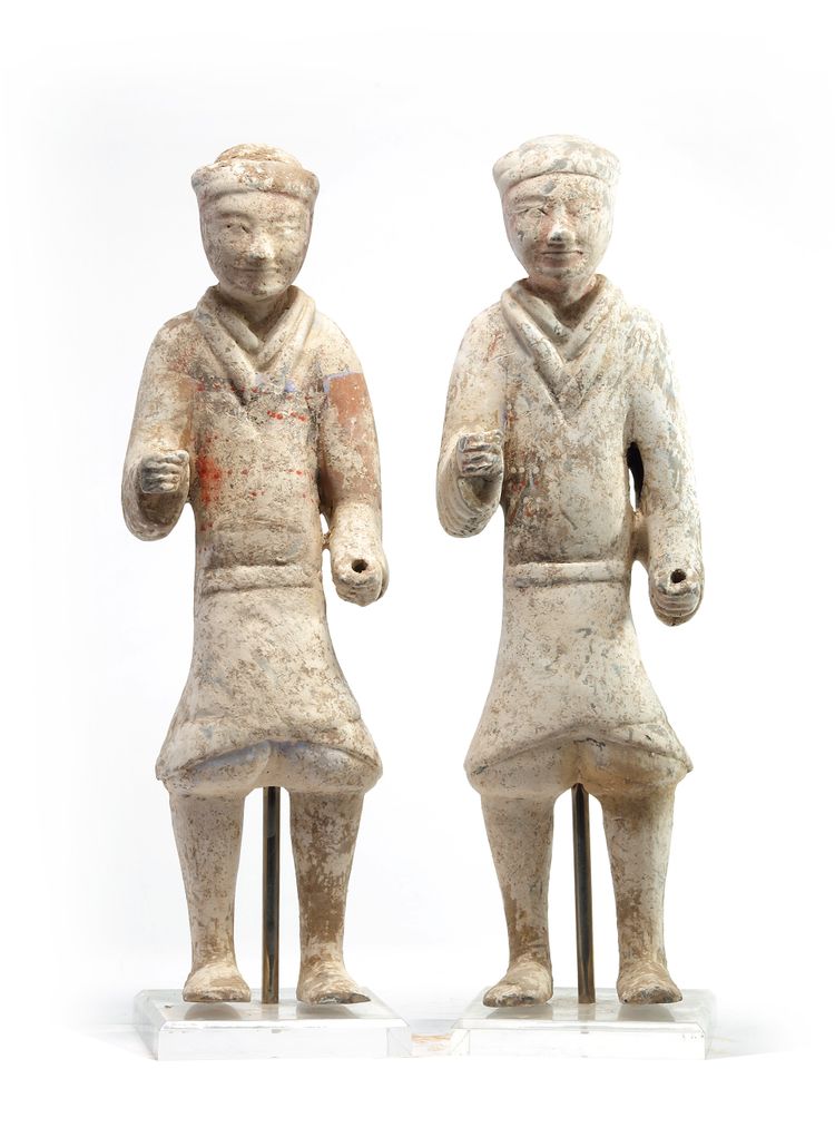A pair of Chinese painted pottery standing soldiers