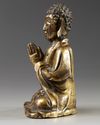 A CHINESE  GILT BRONZE FIGURE OF A BUDDHA, LATE MING DYNASTY, 17TH CENTURY