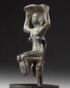 A WESTERN ASIATIC PROTO-ELAMITE STATUETTE, CIRCA 3100-2700 B.C.