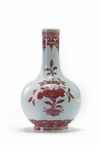 A Chinese underglaze copper red 'Three Abundances' bottle vase