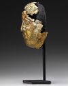 A GRECO-ROMAN GILT BRONZE MASK, CIRCA 1ST CENTURY B.C. / A.D.