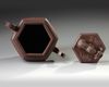 A Chinese Yixing hexagonal teapot and cover