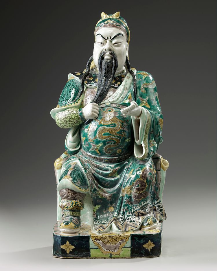 A Chinese famille verte biscuit figure of Guandi