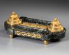 A FRENCH 'EMPIRE STYLE' INKWELL IN GILT BRONZE, 19TH CENTURY